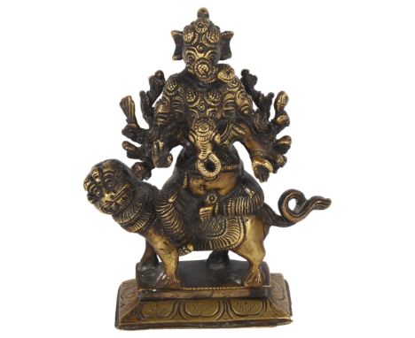 A bronze study of Ganesh seated on a dog of fo, H16cmGood overall condition, no obvious damage or repairs, some light surface