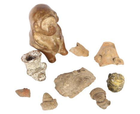 2 ceramic pre-Colombian figures of animals, and 7 pre-Colombian ceramic faces 