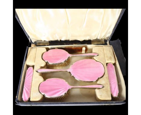 WALKER & HALL - a George V silver and pink enamel dressing table brush and mirror set, in fitted case, hallmarks for Birmingh