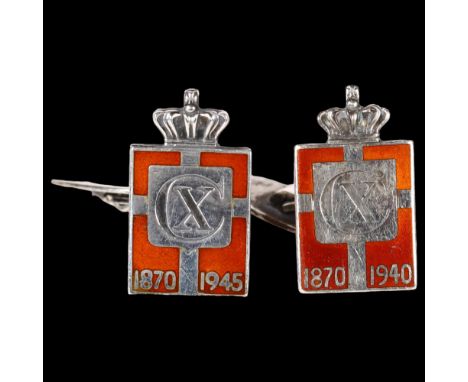 GEORG JENSEN - a pair of sterling silver and red enamel Kingmark cufflinks 