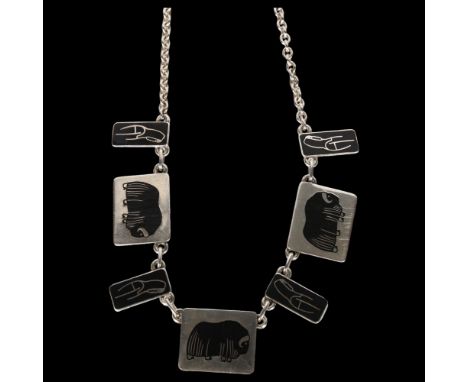 JENS TAGE HANSEN - a sterling silver and black enamel bison and Inuit design panel fringe necklace 