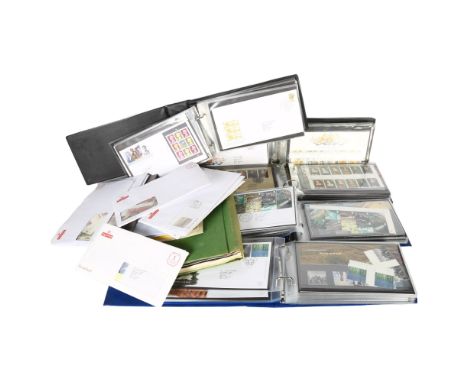 A large collection of First Day Covers (9 albums), loose First Day Covers, empty albums etc 