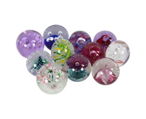 A quantity of glass paperweights including Caithness and others, including Caithness Fountain Scotland, Caithness Cauldron Ru