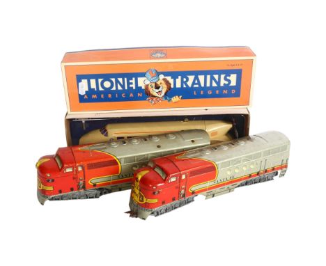 Marx, 2 Santa Fe O gauge tinplate locomotives, L30cm, and a boxed Lionel Lines wind-up tin train with spinning propeller, run
