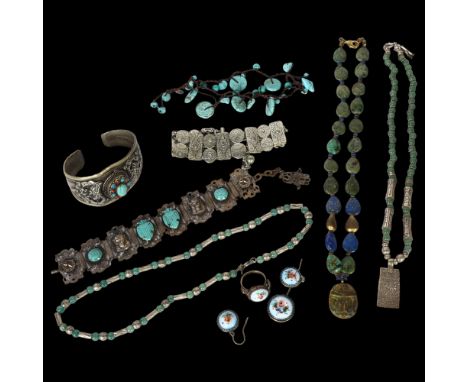 A group of Middle Eastern stone set white metal jewellery, including amethyst set torque bangle, panel bracelet, necklace etc