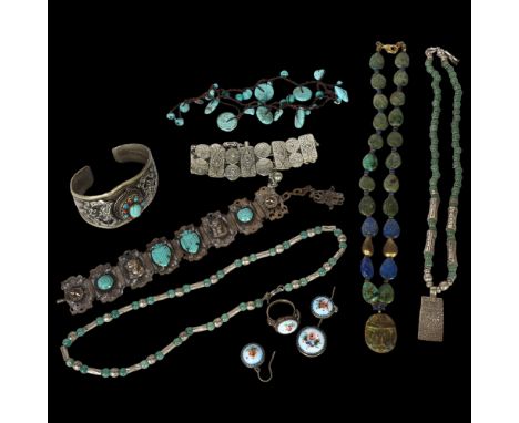 A group of Middle Eastern stone set white metal jewellery, including amethyst set torque bangle, panel bracelet, necklace etc