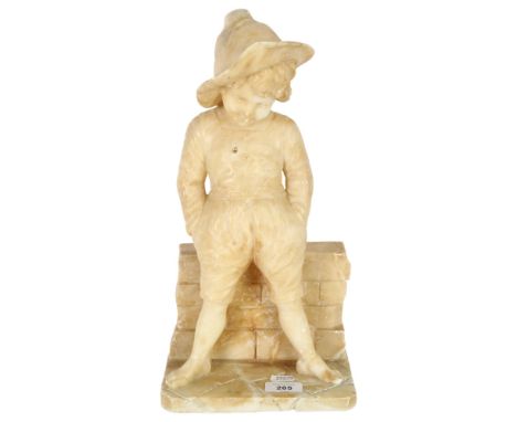 A large Victorian alabaster figure of a boy standing against a wall, H39cmGeneral condition is good, there appears to be dama