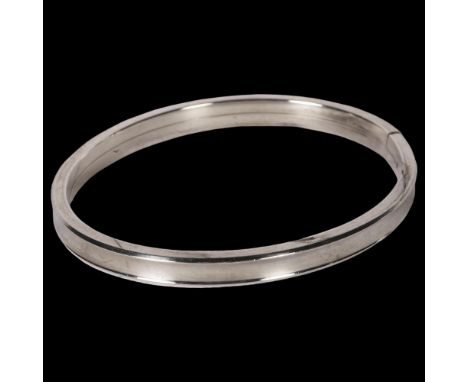 C H R WEILSKOV, COPENHAGEN - oval silver bangle of plain form, overall diameter 68mm 