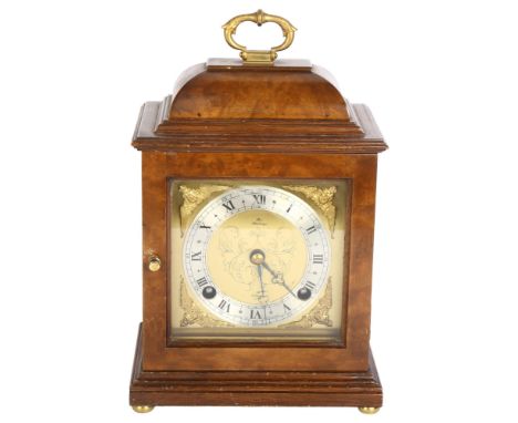 An Elliott walnut-cased 8-day mantel clock, with a French escapement, retailed by Rix of Hastings, with key, height not inclu