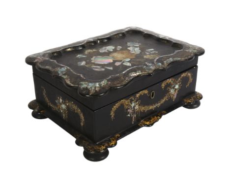 A Victorian papier mache jewel box with inlaid mother-of-pearl decoration, width 25cmGeneral light crazing and gilt rubbing, 