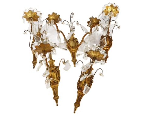 A set of mid-20th century crystal hung gilded brass wall sconces, comprising 4 single light and 1 double lightA few small chi