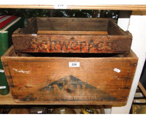A Vintage Schweppes box and a pine Libby's milk box.