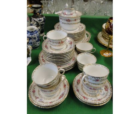 Victoria porcelain tea service with pink rose decoration.