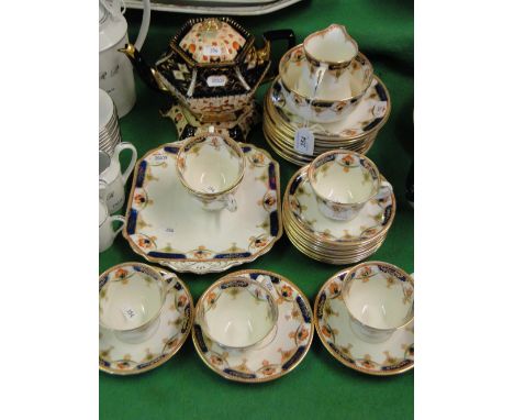 An Edwardian tea service and an Imari style teapot.