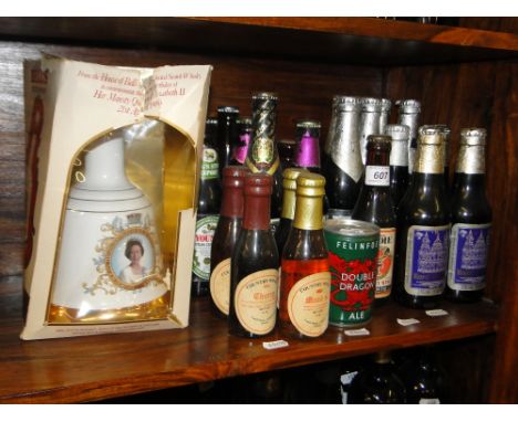 22 Various bottles of beers, wine and cider, a bottle of Queen Elizabeth's 60th birthday Bells Whisky in Wade decanter.