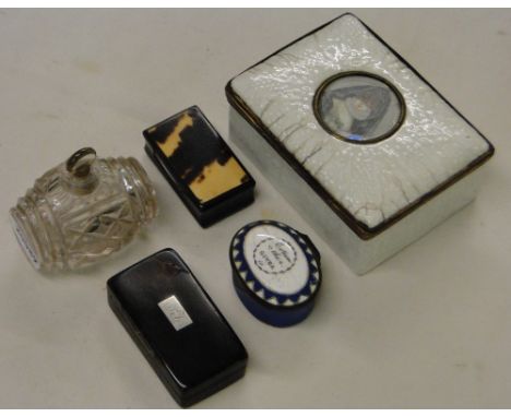 An enamelled box with portrait decoration, 2 snuff boxes and enamelled pillbox and a cut-glass scent flask.