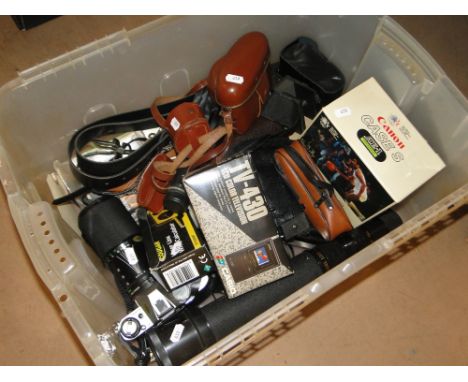A box of Vintage cameras, miniature tv, etc.