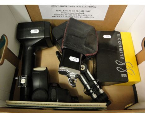 Vintage cine cameras and flash units.