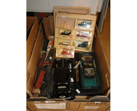 Lledo and other toy cars and model railway items.