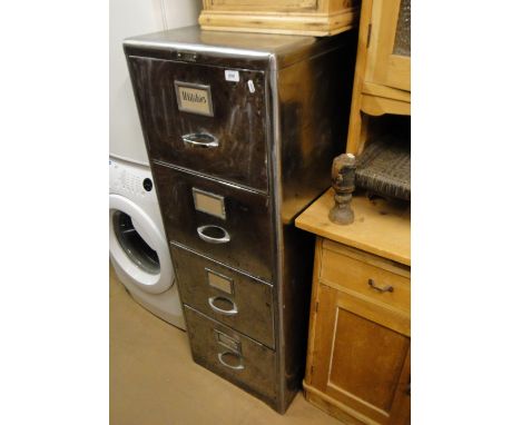 A Vintage polished metal 4-drawer filing cabinet.