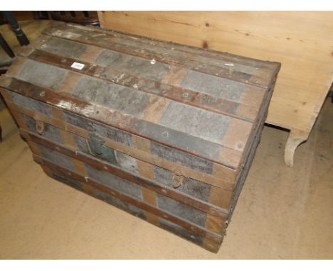 19th century domed top travelling trunk.