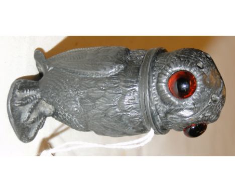 Antique pewter owl figure desk sander with glass eyes.