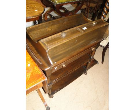 An Ercol dark elm hanging rack with 2 drawers and a Ercol dark elm 3-tier tea trolley with frieze drawer.