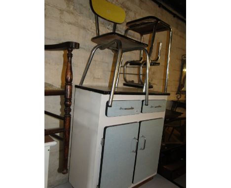 A Vintage white painted kitchen cabinet with similar draw leaf kitchen table, 3 matching chairs and stool.