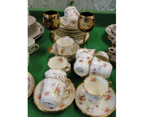 Edwardian Atlas china tea service with floral decoration and a pair of gilded and enamelled goblets.