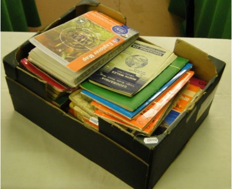 A box of Ordnance Survey maps.