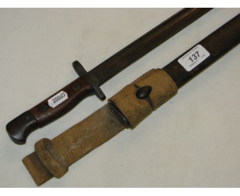 A Wilkinson's First World War bayonet in scabbard.