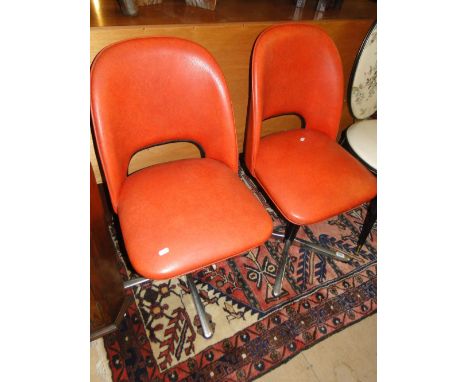 Pair of Vintage rexine covered swivel chairs by Centa, labels on the underside.