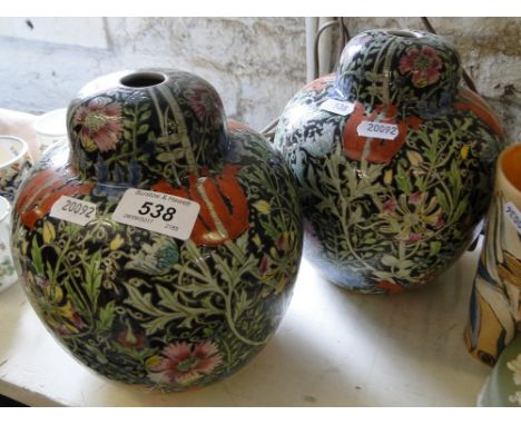 A pair of Oriental painted pottery lamp bases.