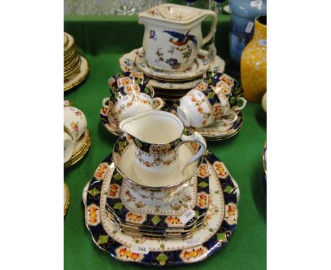 1930s Staffordshire teaset, a teapot and decorative plates.