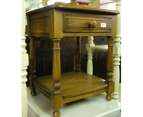 A modern Ercol single drawer side table.