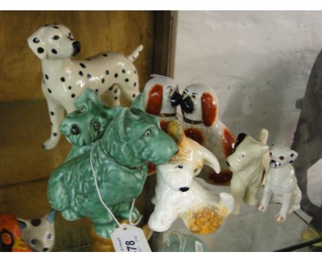 Pair of spaniels and 6 other dog figures including Sylvac.