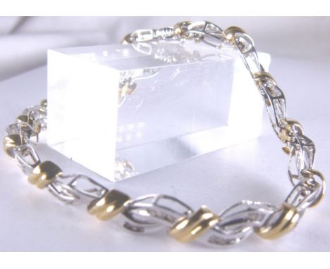 10 K yellow and white gold with 84 diamonds, princess and diamond cut approximately 1.5 ct