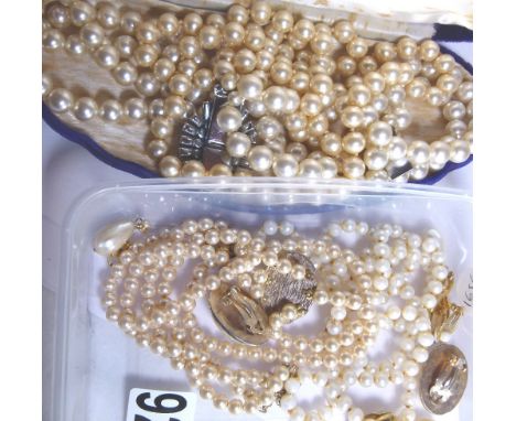 Collection of pearl necklaces and earrings