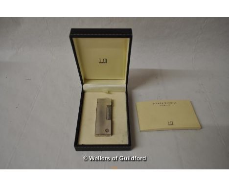 A Dunhill cigarette lighter, number 15881, with box and original receipt dated 16.12.00