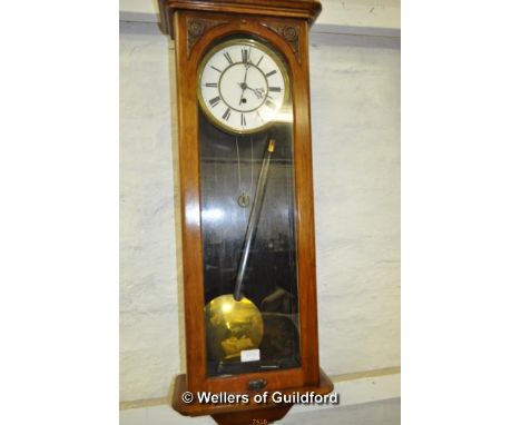 A mahogany regulator, white enamel dial with Roman numerals, 94cm.