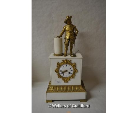 A French white marble mantel clock surmounted with the figure of a cavalier, the white enamel dial with two train movement an