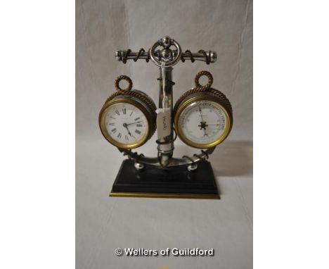 A nautical theme clock/barometer/thermometer, the stand modelled as an anchor entwined with rope, 22cm high overall.
