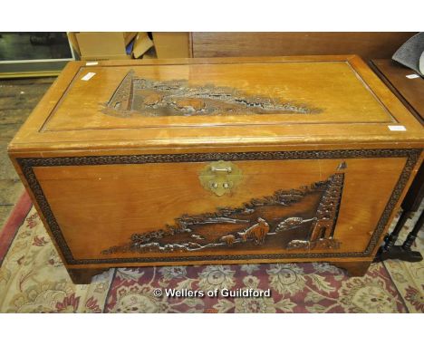 A carved camphorwood trunk, 60x 103 x 53cm.
