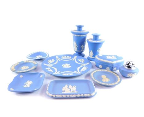 A group of Wedgwood light blue Jasperware, including vases, pair of candlesticks, table lighter, heart shaped box and cover, 