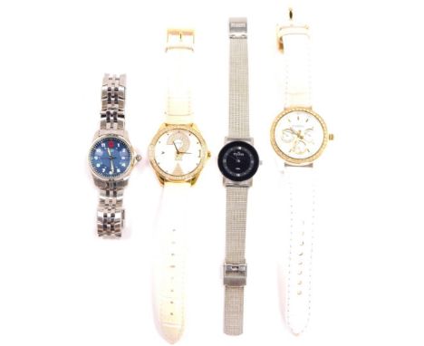 Four lady's dress wristwatches, comprising Skagen, Fossil, Guess and Swiss Army, boxed or cased.