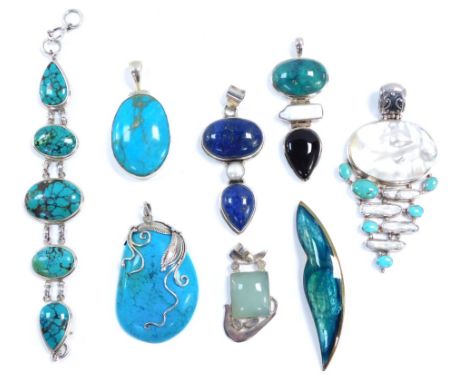 A group of Eastern inspired turquoise and lapis mother of pearl set pendants and bracelets, to include a turquoise set pendan