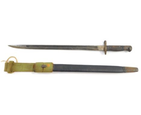 An early 20thC bayonet, with a steel blade, unmarked, in scabbard, marked BSC19420, 54.5cm wide. 