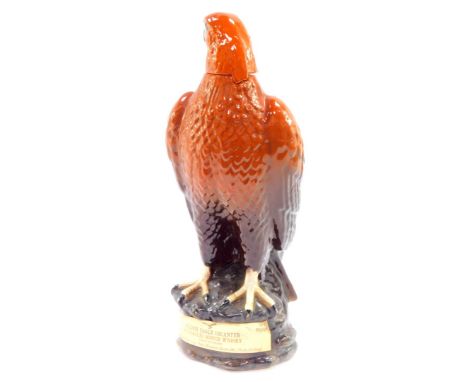 A Beswick pottery decanter modelled as golden eagle by J G Tongue 1969, for Beneagles Scotch Whisky, Peter Thomson (Perth) li