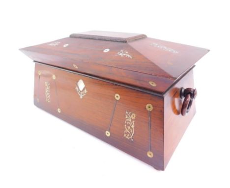 A Regency rosewood and mother of pearl inlaid tea caddy, of sarcophagus form, with twin loop handles, the hinged lid opening 