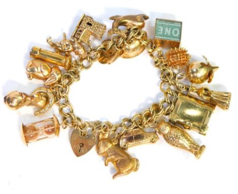 A 9ct gold charm bracelet, with various charms, some hallmarked and stamped 9ct and some unmarked, hallmarked to include car 